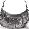 Le Cagole pieni olkalaukku, metallisoitu ”Silver” 6713070GT3Y8103
