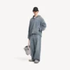 Miesten tummansiniset denim-ompeleiset löysät farkut Miesten tummansiniset denim-ompeleiset löysät farkut