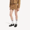 Naisten beige puuvillainen minihame Naisten beige puuvillainen minihame