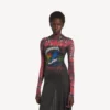 Naisten musta pitkähihainen mekko, jossa on voimakas tie-dye-kuvio Naisten musta pitkähihainen mekko, jossa on voimakas tie-dye-kuvio