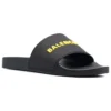 Uimahallikengät ”Black Yellow” 565826W1S801070
