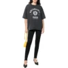 Varsity-logolla varustettu lyhythihainen T-paita ”Washed Black” 612966TMV981000