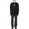 Yhtenäisvärinen, kauttaaltaan logolla koristeltu neuletakki ”Black” 720058T16611000